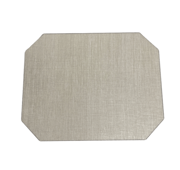 The Julian Mejia Bespoke Emerald Cut Rectangle Placemat Martini Set of 4 features beige placemats with angled corners, a subtle textured pattern, and stitched edges for an elegant look, shown against a white background.