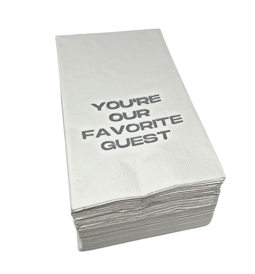 The Print Appeal Guest Hand Towel Pack Favorite Guest features white hand towels with "YOU’RE OUR FAVORITE GUEST" in bold black letters—ideal for displaying in an acrylic guest towel holder.