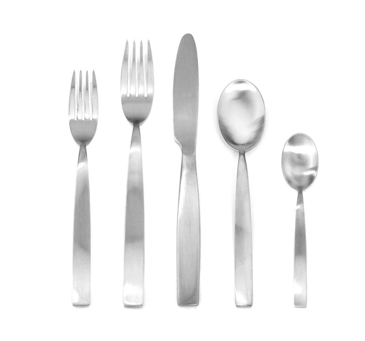 The Mepra Mediterranea Flatware 5 Piece Setting—two forks, a knife, a spoon, and a teaspoon—is arranged in a row on a white background.