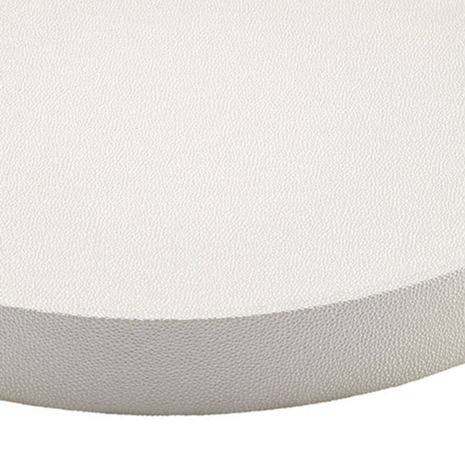 A close-up of the Bodrum Skate Round Oyster Tray, featuring a white, textured surface and slightly curved edge, shown against a plain background.