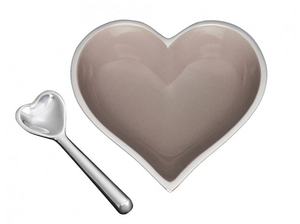 The Happy Heart Snack Bowl & Spoon by Inspired Generations features a heart-shaped gray candy dish with a matching silver spoon, both handcrafted from aluminum, displayed on a white background.