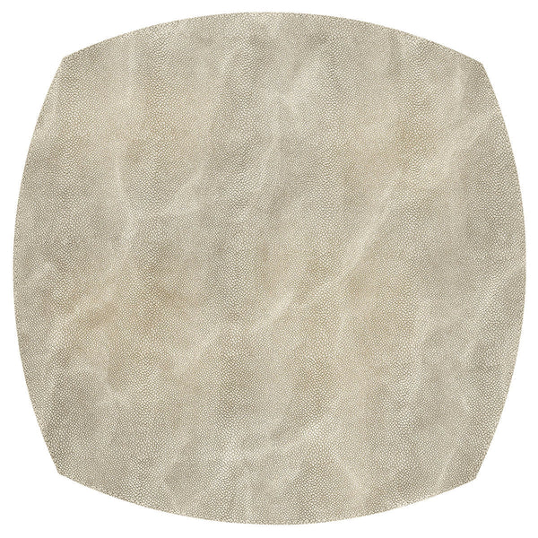 The Bodrum Stingray Elliptical Square Placemat Pearl Set of 4 features round, beige phthalate-free vinyl placemats with a subtle textured pattern, resembling leather or parchment, shown from above on a white background.