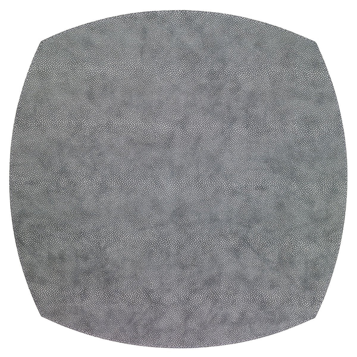 The Bodrum Stingray Elliptic Placemat Grey Set of 4 features large, nearly circular grey mats with subtly curved edges and dense, irregular white dot patterns on a white background. Crafted from phthalate-free vinyl.
