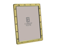 The Addison Ross Locket Frame Gold features a gold metal finish with round decorative studs and displays a CH Current Home placeholder image. It comes in a stylish gift box, making it an elegant gift choice.