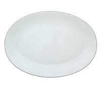 The Monceau Oval Platter Platinum Large by Raynaud is an elegant Limoges porcelain piece, featuring a plain oval shape, smooth surface, and slightly raised edges—perfectly photographed on a white background.