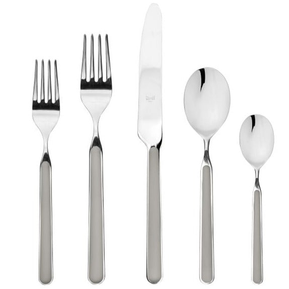 The Mepra Fantasia Flatware 5 Piece Set includes a salad fork, dinner fork, dinner knife, soup spoon, and teaspoon with modern handles; dishwasher safe and available in 16 colors.