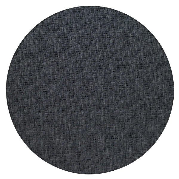 The Bodrum Wicker Round Placemat Black Set of 4 features dark gray woven vinyl with a subtle textured pattern, phthalate-free for easy care and everyday use, shown from above on a white background.