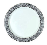 The Michael Wainwright Panthera Dinnerware Platinum features a modern white plate with a bold black and white dalmatian-like rim, adding a striking touch to your porcelain set.