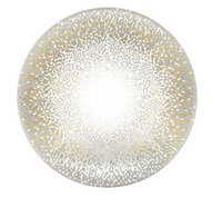 The Haviland Souffle D'or Dinnerware features a round Limoges porcelain plate with a white center, adorned with gold and silver dots in a radiant gradient toward the rim.