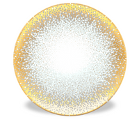 The Haviland Souffle D'or dinnerware features a round Limoges porcelain plate with a white center and gold-silver dotted pattern radiating to the rim, creating a shimmering effect. Shown against a white background.