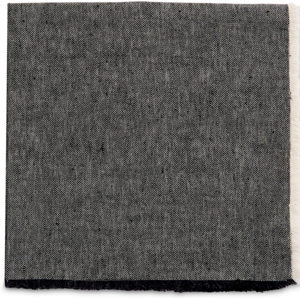 The Woven Washed Fringe Napkin Jet Set of 4 by Deborah Rhodes features square grey woven fabric with a subtle herringbone pattern, frayed bottom edge, and a light strip on the right side.