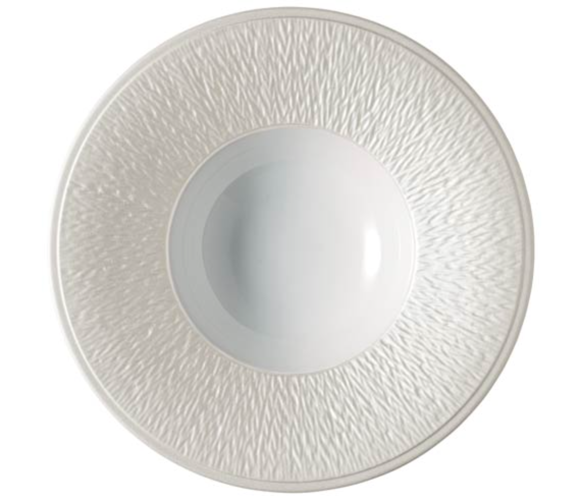 A white, round Raynaud Mineral Irise Dinnerware Pearl Grey porcelain plate with a textured rim and smooth center, shown from above on a plain background.