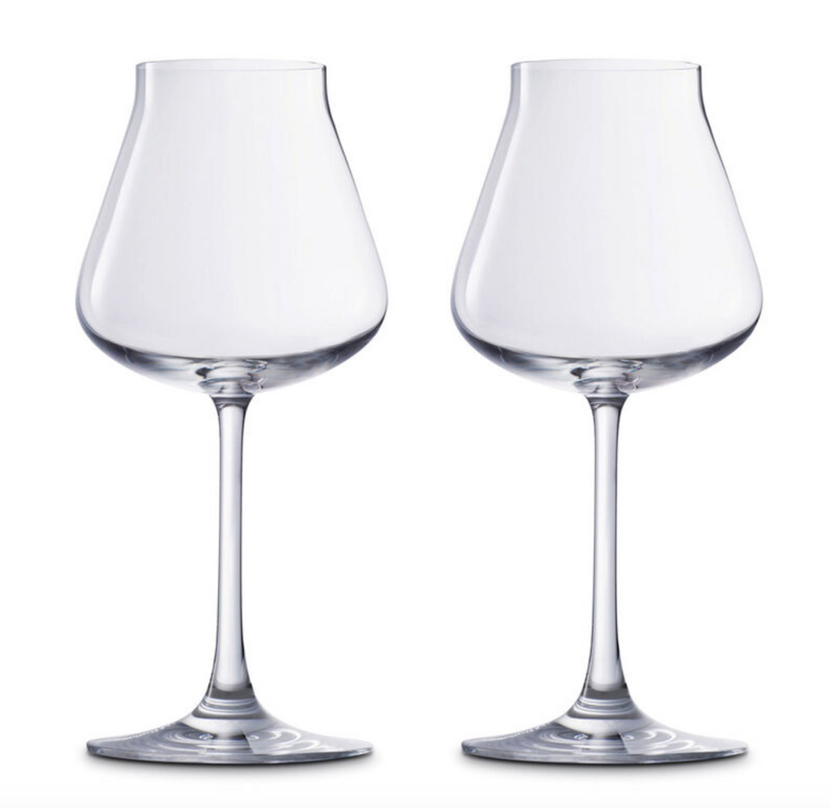 Two clear, empty Chateau Barware wine glasses with long stems by Baccarat are placed side by side against a plain white background, showcasing elegant crystal stemware.