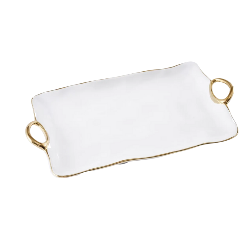 The PAMPA BAY Gold Handle Tray Large is a rectangular white porcelain tray with gold edges and two gold handles on each short side. Dishwasher safe, it's perfect for elegant serving and is shown on a white background.