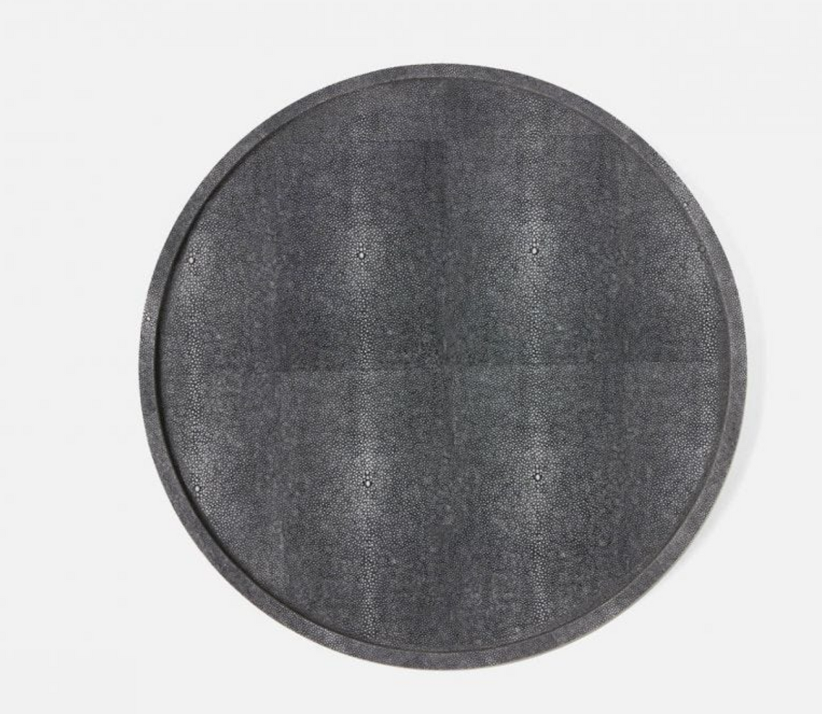 The Blue Pheasant Calvin Faux Shagreen Lazy Susan Grey, a large round tray with a dark gray textured finish, is displayed on a white background—an elegant and essential centerpiece for entertaining.