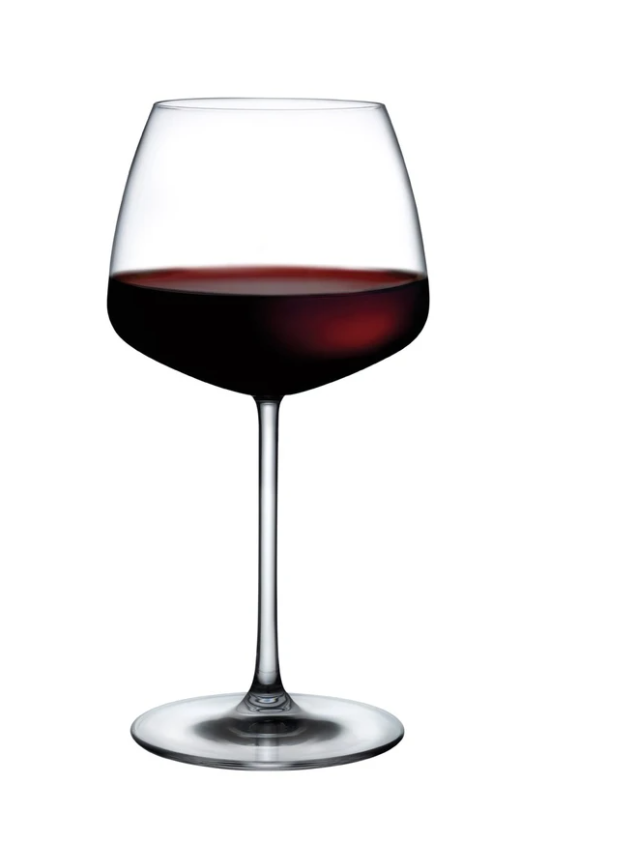 A Mirage Barware wine glass by Nude Glassware, made of lead-free crystal and filled halfway with red wine, is displayed against a plain white background.