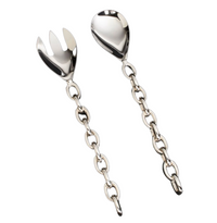 The Inspired Generations Linky Salad Set features handcrafted, polished aluminum servers with chain-link handles; includes one spoon and one fork.