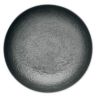 The Raynaud Mineral Irise Dinnerware in Black features a round, textured dimpled plate with a subtle hammered-metal look and smooth, slightly raised rim, offering a contemporary twist on classic design.