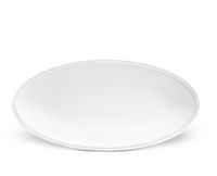 The Soie Tressée White Dinnerware by L'Objet features an oval-shaped white dinner plate with a decorative beaded edge, elegantly displayed against a plain white background.