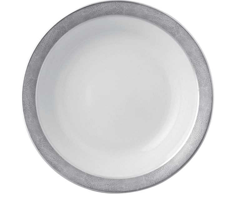 The Bernardaud Sauvage Grey & Platinum plate features a white ceramic center and a textured, platinum-gray rim with a snake skin-inspired design, shown from above against a plain background.