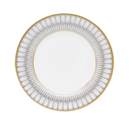 A Philippe Deshoulieres Arcades Gold porcelain plate with an ornate gold and gray border, shown from above on a plain white background.