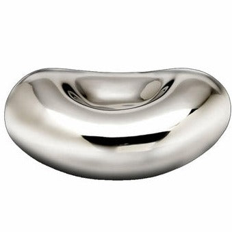 The Bean Silver Bowl by Inspired Generations features a shiny, metallic, kidney-shaped form with a smooth, reflective surface and a shallow indented center. Its unmistakable aluminum finish perfectly embodies modern design—resembling a contemporary art sculpture or a striking decorative bowl.