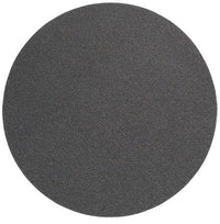 The Bodrum Skate Placemat Round Charcoal Set of 4 features dark gray, round placemats with a textured surface, offering a stylish and modern alternative to traditional vinyl mats.