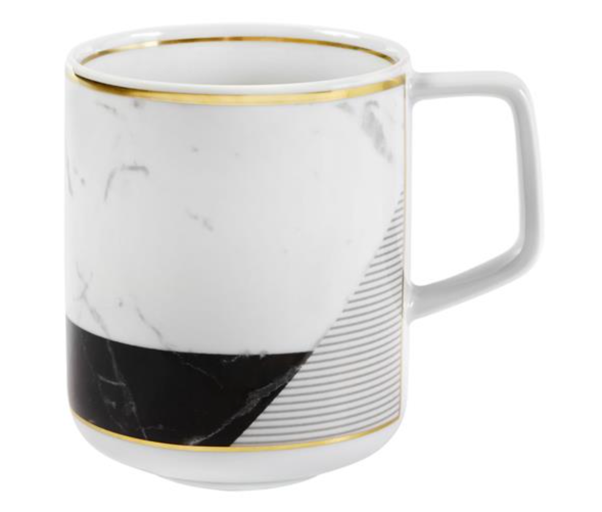 The Carrara by Coline Le Corréa Dinnerware from Vista Alegre is a white ceramic mug with a Carrara marble pattern, gold-trimmed rim and base, diagonal black section with fine white lines, and a rectangular handle—a chic designer piece.