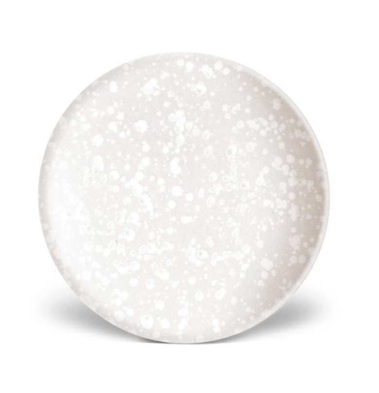 The Alchimie Dinnerware White plate by L'Objet features a round, white ceramic design with a subtle speckled pattern, shown on a white background with a soft shadow.