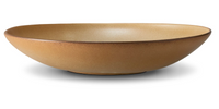 The L'Objet Terra Leather Dinnerware bowl is a wide, shallow tan ceramic piece with a smooth matte finish, hand-crafted and displayed against a white background.
