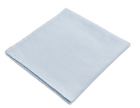 The Linen Sateen Napkin Light Blue Set of 4 by L'Objet, handmade in Portugal from 100% linen, is shown neatly folded on a white background.