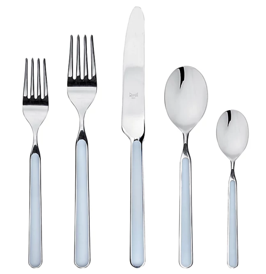 The Mepra Fantasia Flatware 5 Piece Set in light blue features stainless steel utensils with resin handles—dinner fork, salad fork, knife, soup spoon, and teaspoon—stylishly arranged on a white background. Available in 16 colors!.