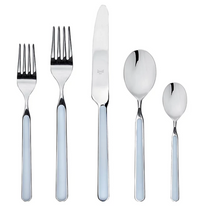 The Mepra Fantasia Flatware 5 Piece Set in light blue features stainless steel utensils with resin handles—dinner fork, salad fork, knife, soup spoon, and teaspoon—stylishly arranged on a white background. Available in 16 colors!.
