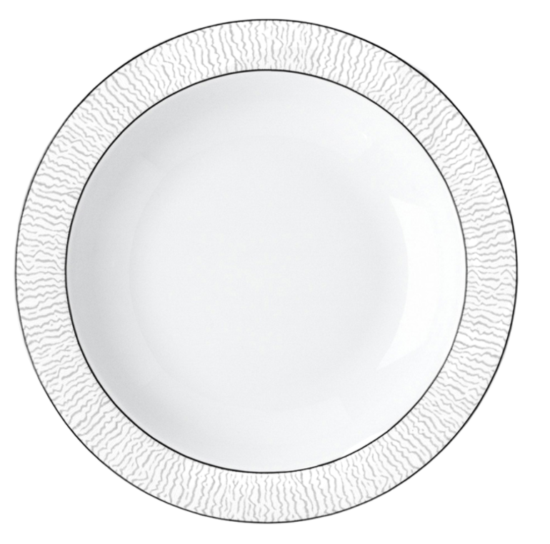 The Dune Dinnerware dinner plate by Bernardaud features round white Limoges porcelain with a textured, wavy outer rim and a smooth center. Handcrafted, it's shown from above on a white background.