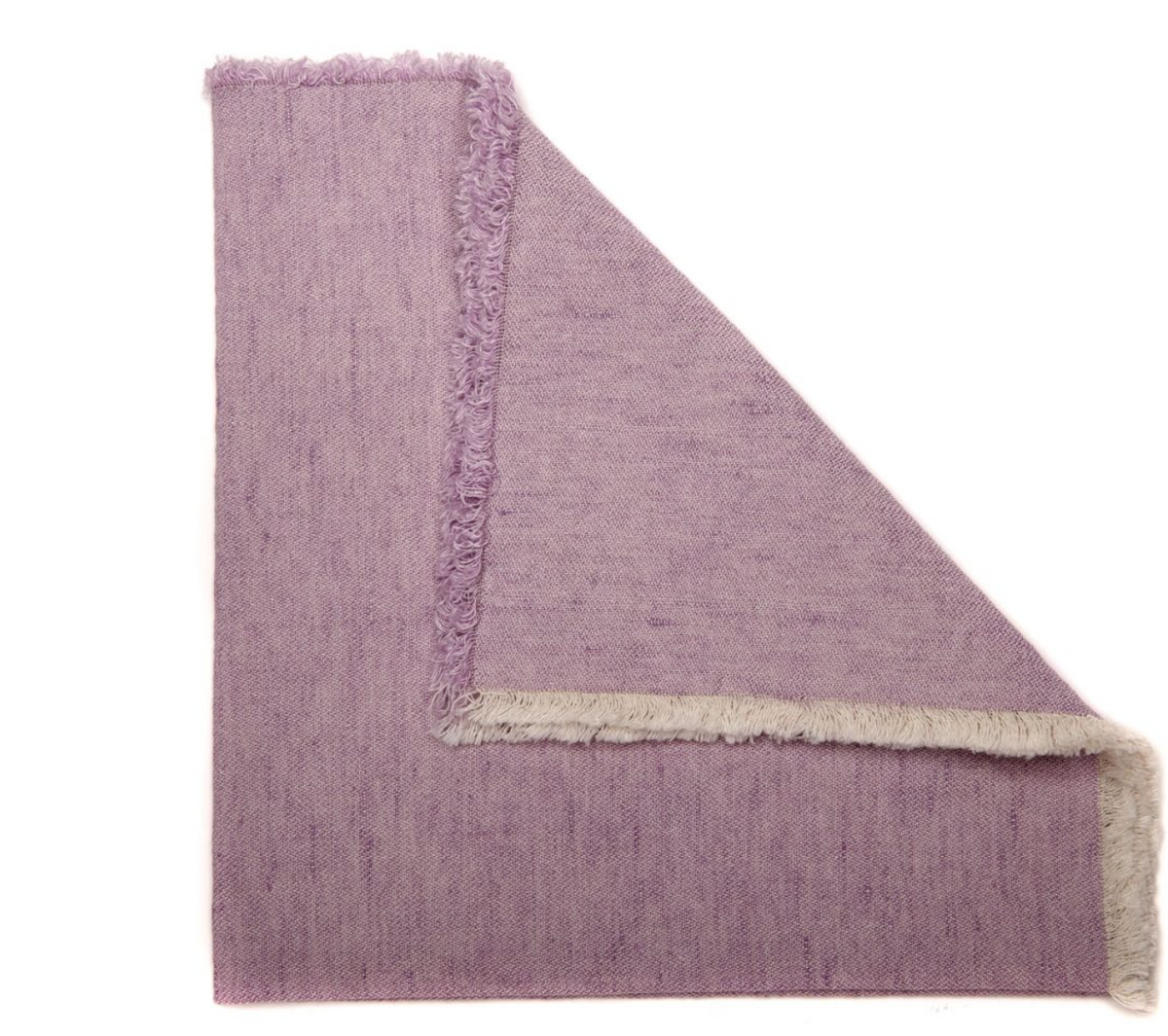 A Woven Washed Fringe Napkin Lavender by Deborah Rhodes lies flat with a corner folded to show its beige fringe underside. The soft linen-cotton napkin features a subtle speckled pattern and comes in a set of 4.