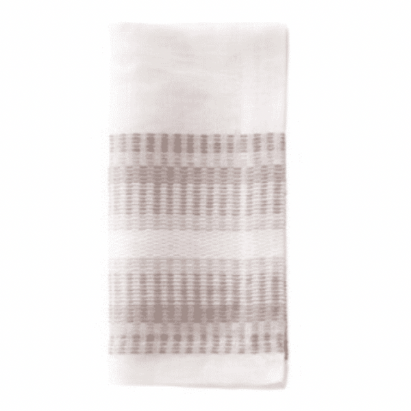 The Bodrum Metro Napkin Neutral Set of 4 features elegant white woven napkins with horizontal taupe stripes, displayed on a white background. These machine washable napkins combine style and easy care.