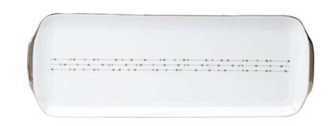 The Carrousel Dinnerware serving platter by Philippe Deshoulieres is a rectangular white Limoges porcelain piece with rounded edges and a simple dot-and-dash line across the center.