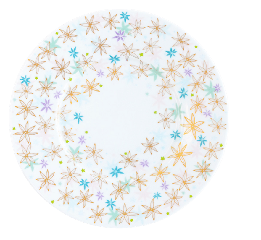 The Fèerie By Michael Cailloux plate by Bernardaud is round, crafted from fine Limoges porcelain, and features a rim decorated with gold, blue, and purple multicolored flowers while the center remains plain.