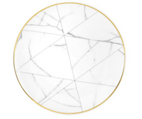 The Carrara by Coline Le Corréa Dinnerware from Vista Alegre is a round white porcelain plate with a gold rim, showcasing intersecting geometric lines and gray Carrara marble-inspired veining.