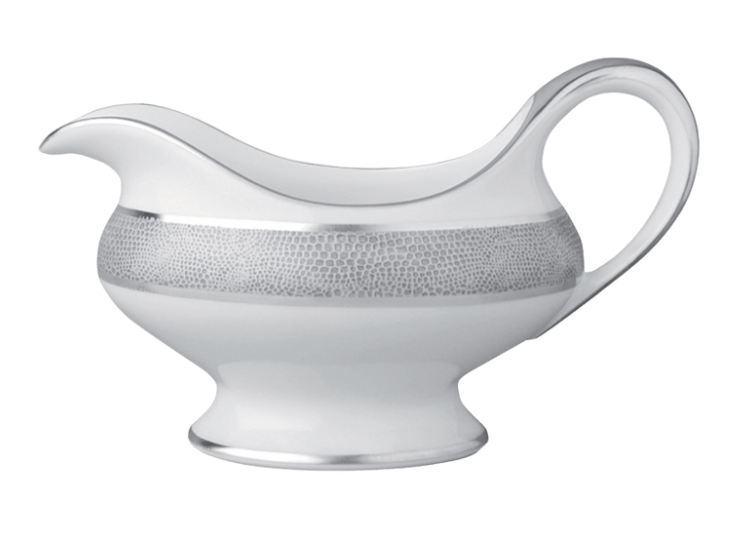 The Bernardaud Sauvage Grey & Platinum gravy boat is crafted from white Limoges porcelain, featuring a wide spout, curved handle, and a platinum snake skin-embossed band.