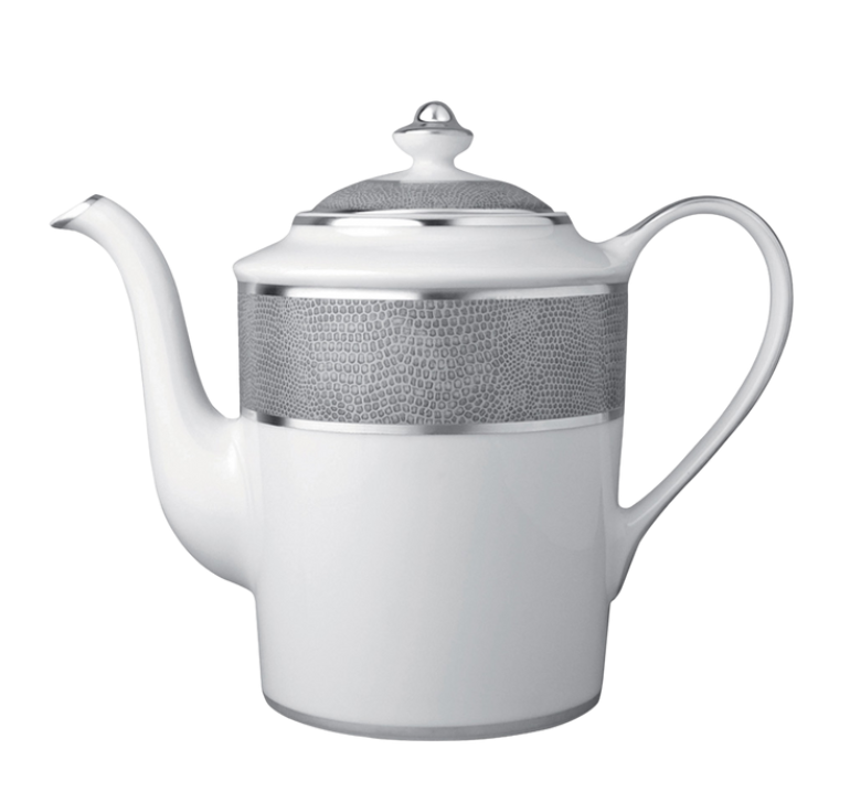 The Bernardaud Sauvage Grey & Platinum teapot is crafted from white Limoges porcelain, featuring a curved spout and handle, with a platinum snake skin-inspired band and a coordinating platinum-accented lid.