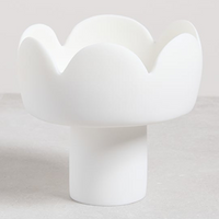 Fleur footed bowl in white resin. 