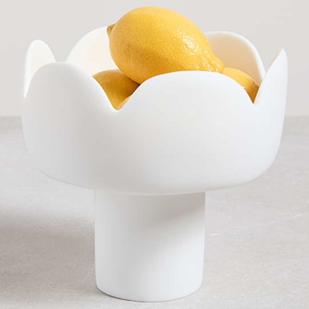 White resin fleur footed centerpiece bowl.