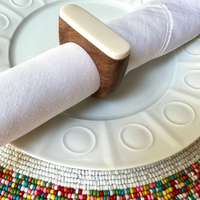 Flow napkin ring in white. 