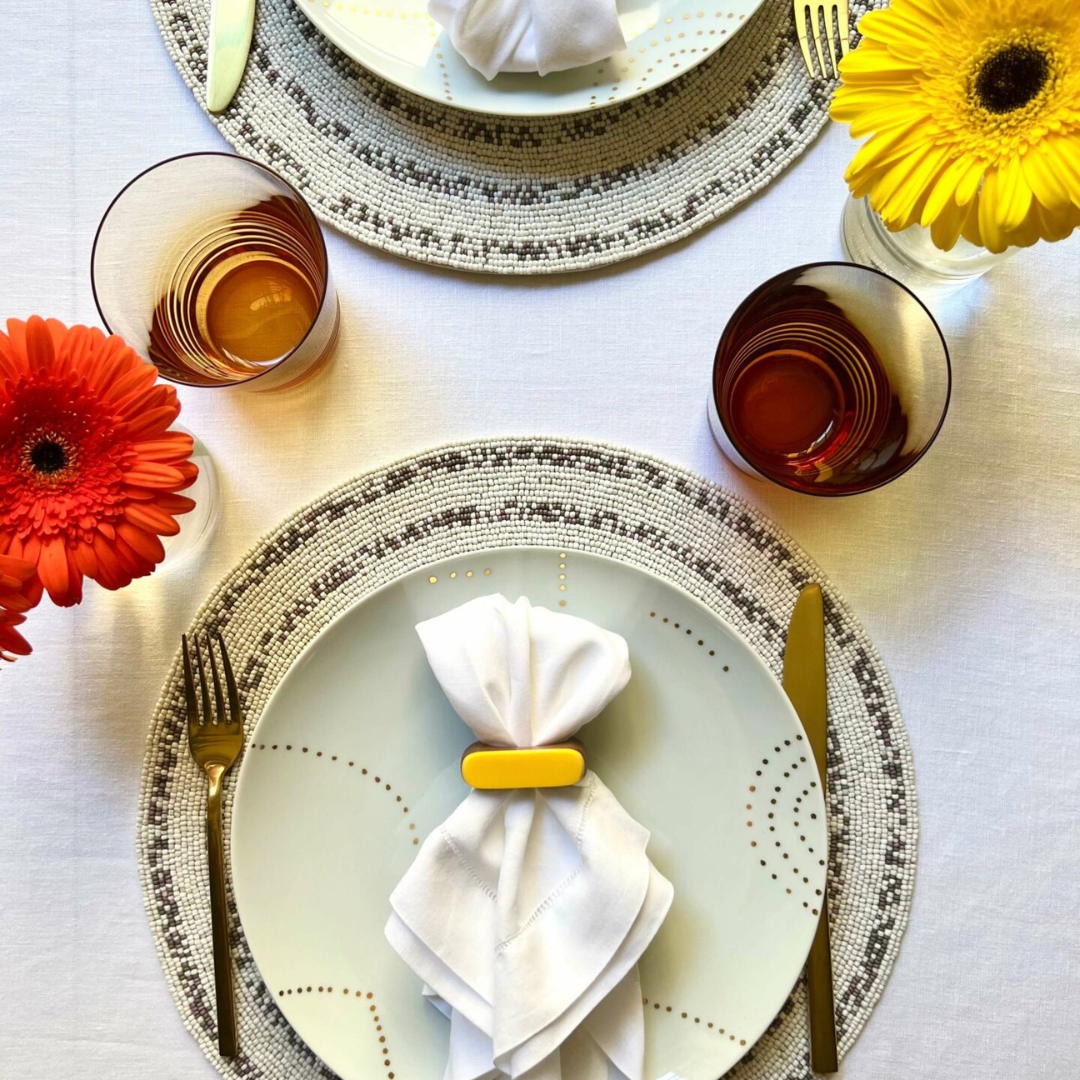 Flow napkin ring in yellow. 