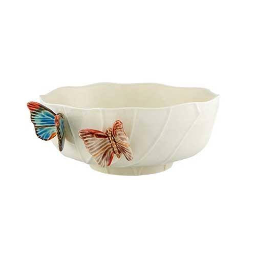 The Cloudy Butterflies Serving Bowl by Vista Alegre is a handcrafted white earthenware dish with a scalloped edge, adorned with two colorful 3D butterflies—one blue-orange, the other red-cream—for a charming accent.