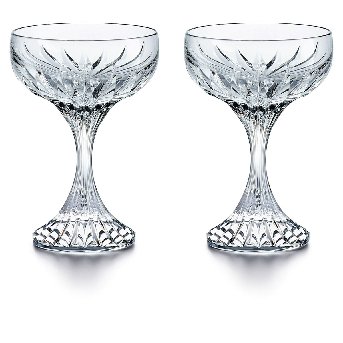 The Baccarat Masséna Coupe Set of 2 features elegant crystal glass coupe glasses with intricate faceted patterns—an exquisite addition to any barware collection.