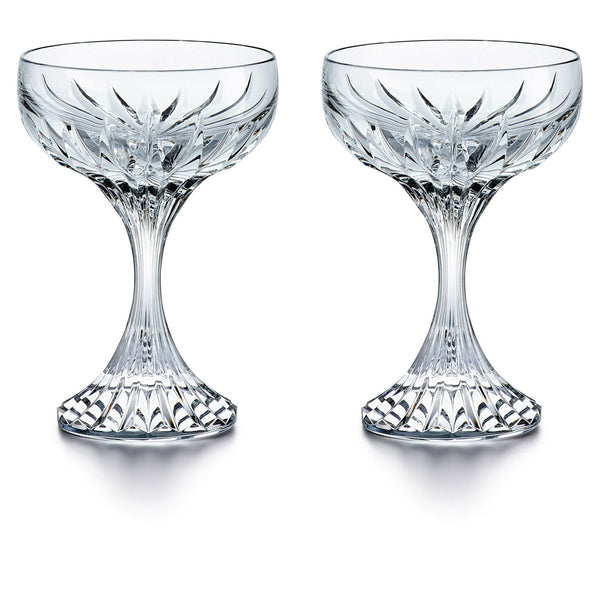 The Baccarat Masséna Coupe Set of 2 features elegant crystal glass coupe glasses with intricate faceted patterns—an exquisite addition to any barware collection.