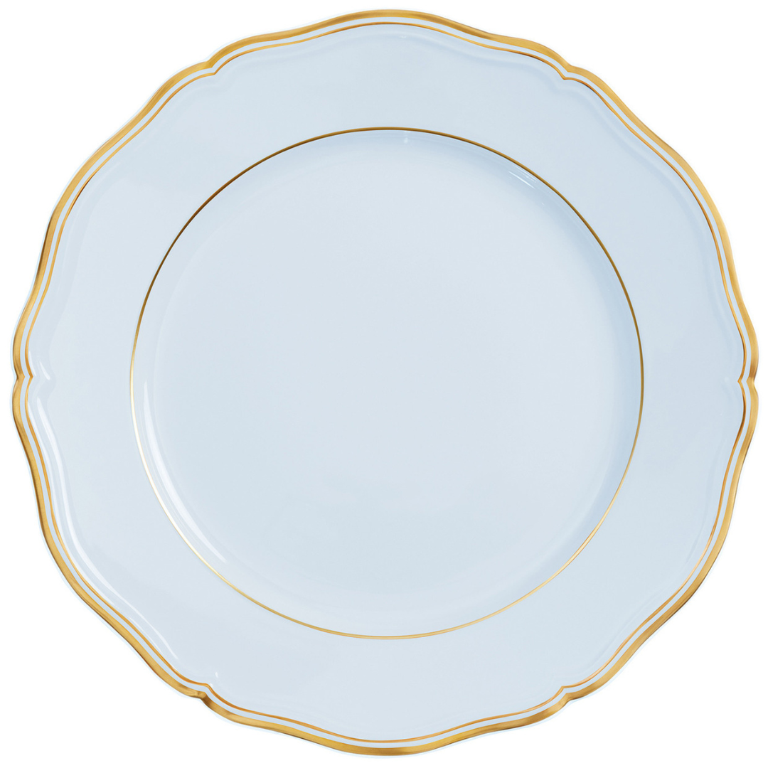 A white porcelain plate with a scalloped edge and thin gold rim, viewed from above on a plain background—part of the Raynaud Mazurka Gold & Blue Grey Dinnerware collection.