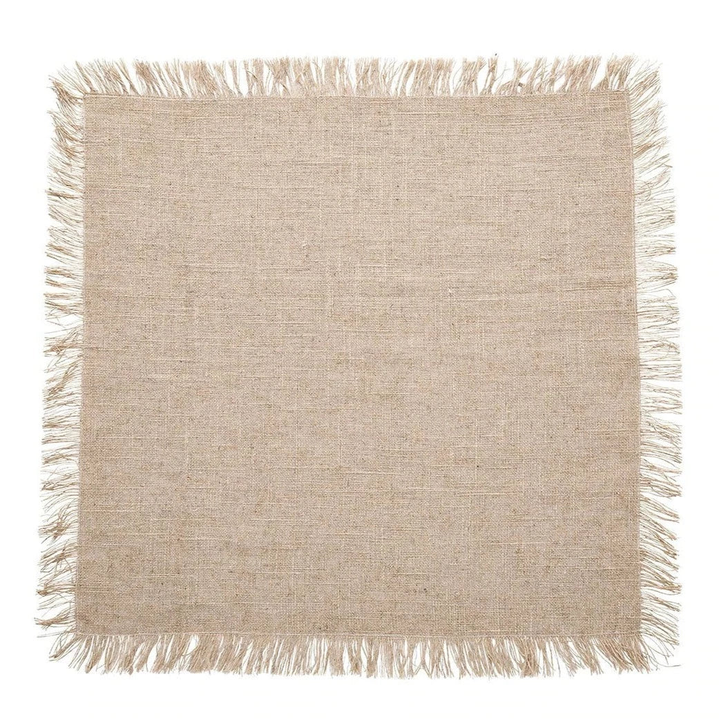 The Kim Seybert Fringe Napkin Silver & Natural Set of 4 features square beige fabric napkins with a rough texture and fringed edges, styled for farmhouse chic décor and shown on a white background.